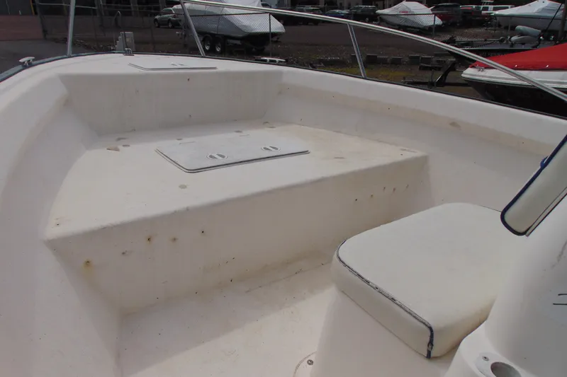 Slide: The Image of 2003 Palm Beach 181 WHITECAP boat interior with seating and storage compartment. - 8