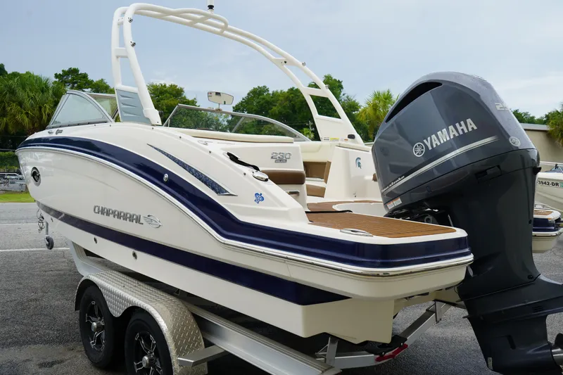 Slide: The Image of 2015 Chaparral 230 Suncoast boat with Yamaha engine on trailer, side view. - 3