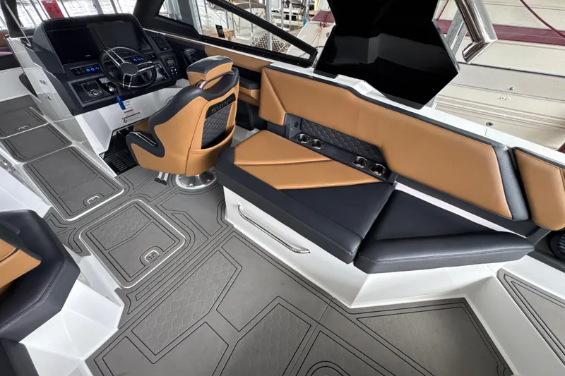Slide: The Image of Interior of 2021 Cobalt R8 Surf boat with modern seating and sleek dashboard design. - 11