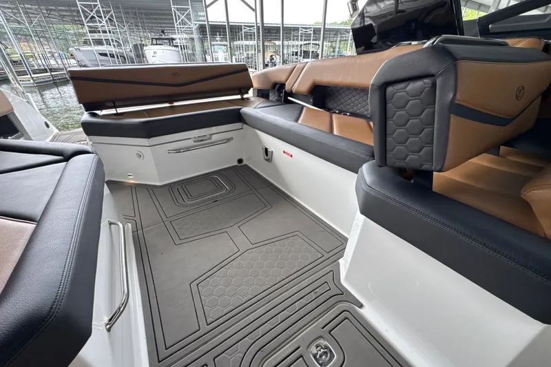 Slide: The Image of Interior of 2021 Cobalt R8 Surf boat with luxurious seating and modern design. - 22