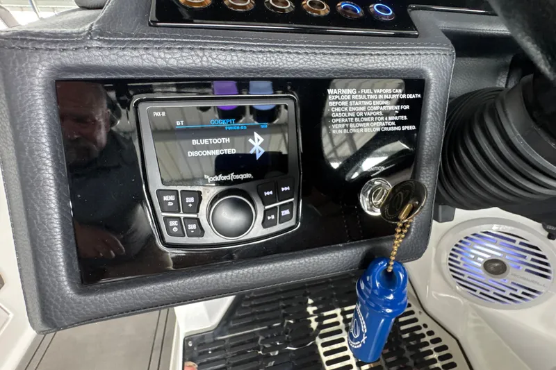 Slide: The Image of 2021 Cobalt R8 Surf dashboard with Bluetooth stereo and ignition key. - 16
