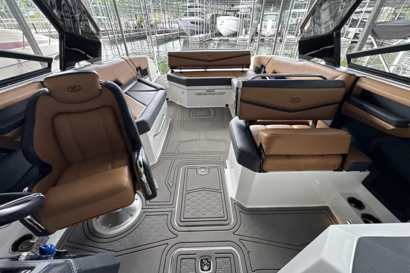 Slide: The Image of Interior of a 2021 Cobalt R8 Surf boat with luxurious seating and modern design. - 30