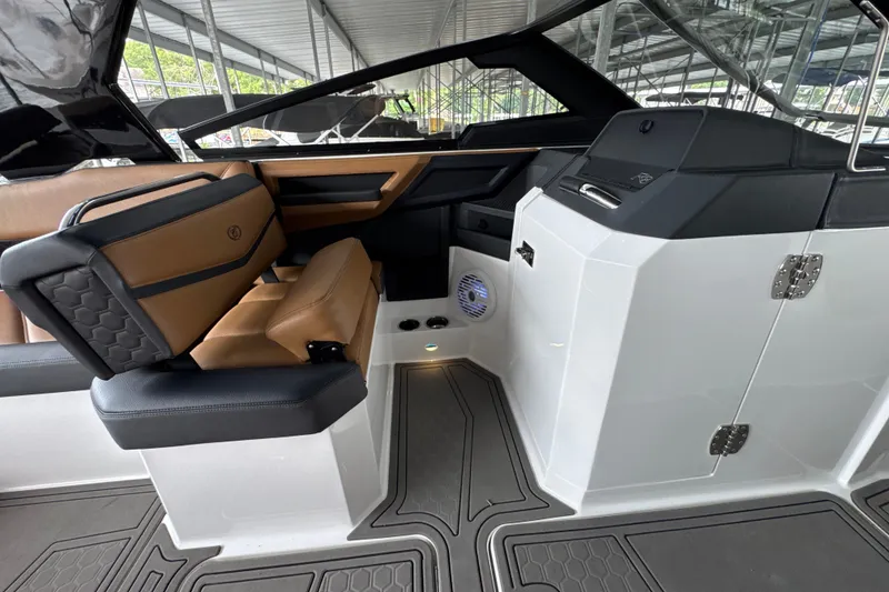 Slide: The Image of Interior of a 2021 Cobalt R8 Surf boat, featuring luxurious seating and modern design. - 20
