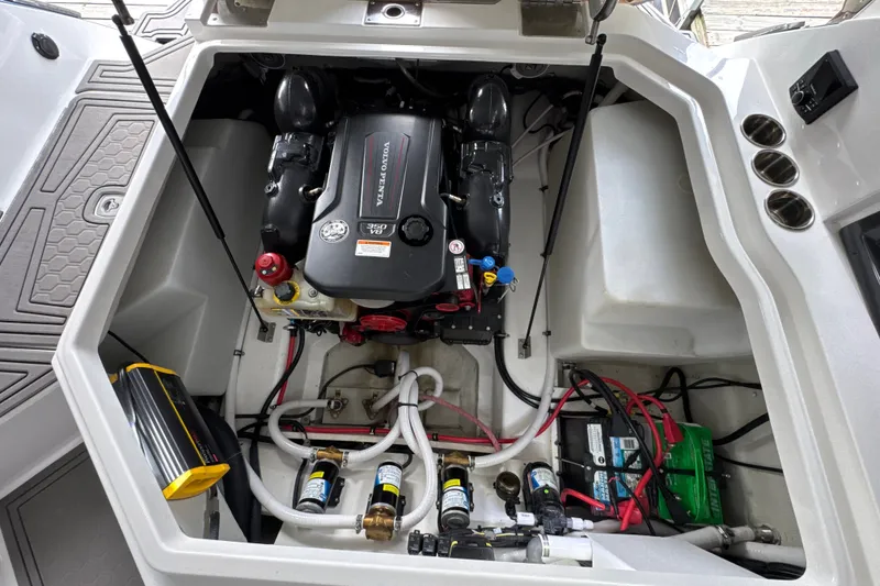 Slide: The Image of Engine compartment of a 2021 Cobalt R8 Surf boat, featuring Volvo Penta V8 engine. - 32