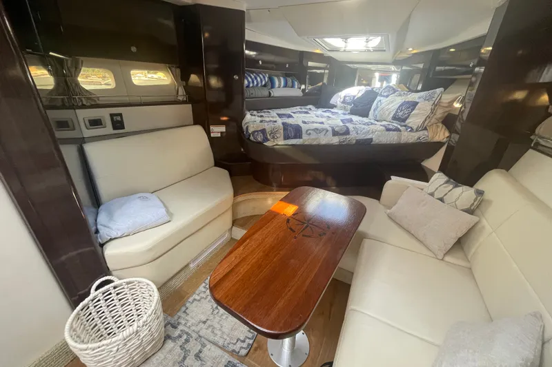 Slide: The Image of Luxurious interior of 2018 Sea Ray Sundancer 350 Coupe with cozy seating and elegant decor. - 13