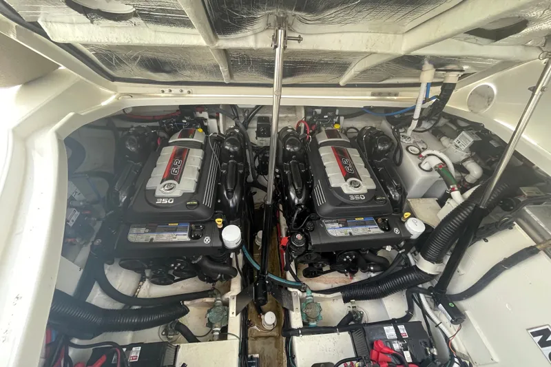 Slide: The Image of Engine room of 2018 Sea Ray Sundancer 350 Coupe with twin 6.2L engines. - 27