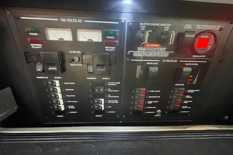 Slide: The Image of Electrical control panel of a 2018 Sea Ray Sundancer 350 Coupe boat. - 32