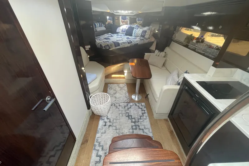 Slide: The Image of Luxurious interior of 2018 Sea Ray Sundancer 350 Coupe with cozy seating and modern amenities. - 12