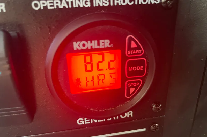 Slide: The Image of Kohler generator display showing 82.2 hours on a 2018 Sea Ray Sundancer 350 Coupe. - 31