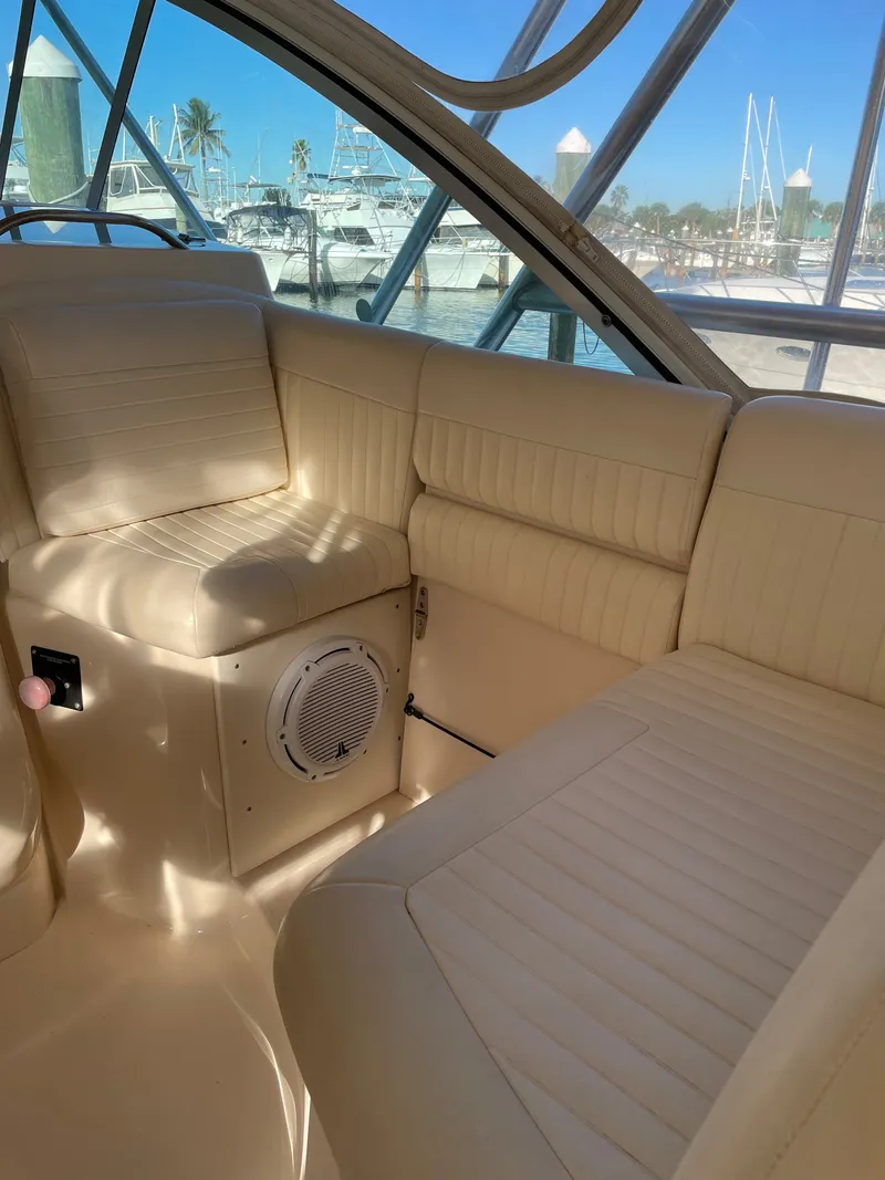 Slide: The Image of The image shows the interior of a 2005 Grady-White Express 360 with beige upholstery. - 17