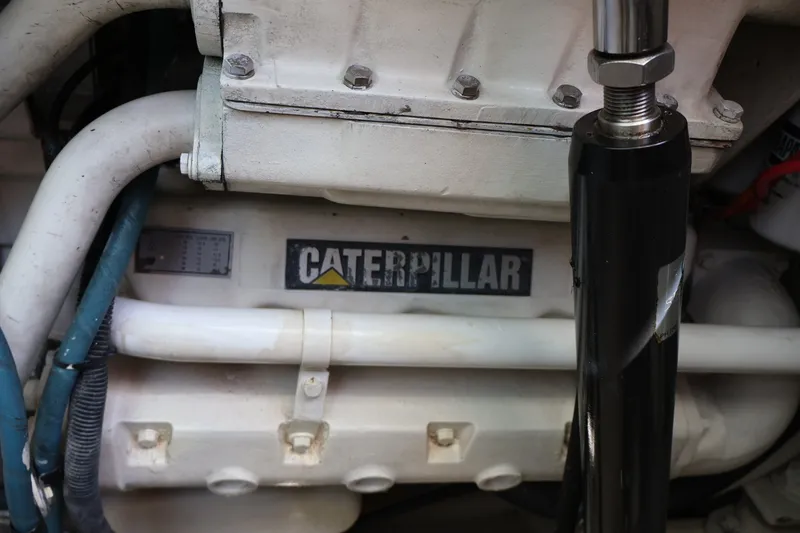 Slide: The Image of Close-up of a Caterpillar engine in a 2001 Cabo 35 Express boat. - 26