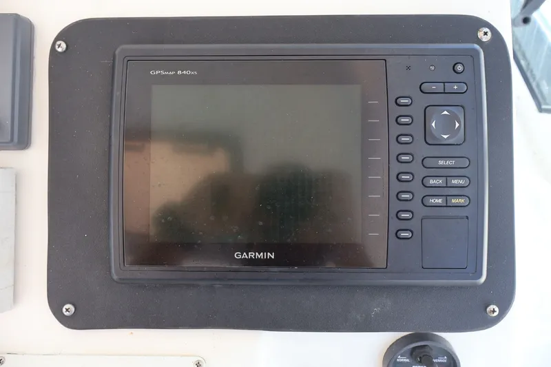 Slide: The Image of A Garmin GPSmap 840xs navigation system is mounted on a boat's dashboard. - 8