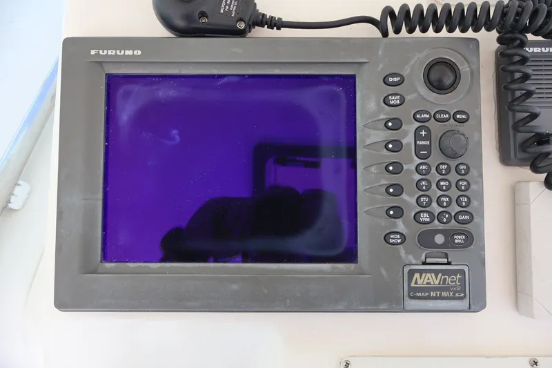 Slide: The Image of A Furuno navigation system with a large screen and numerous buttons is visible. - 9