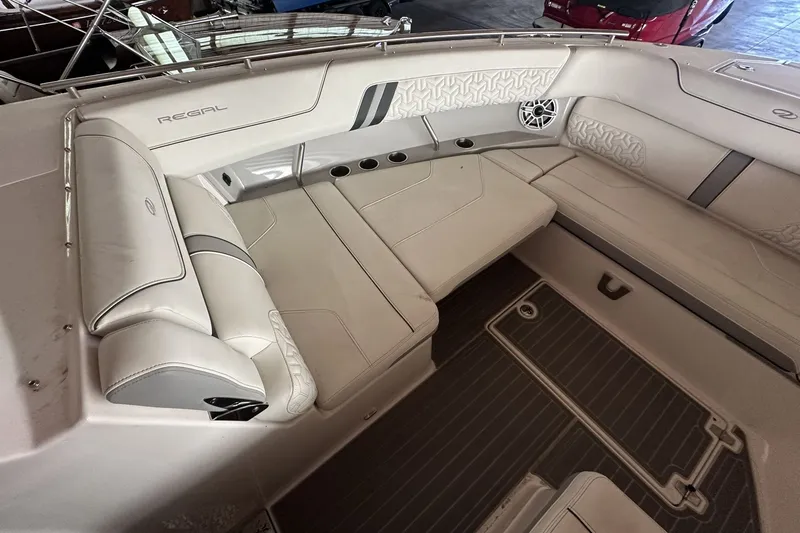 Slide: The Image of Luxurious interior of a 2023 Regal LS36 boat with plush seating and modern design. - 21