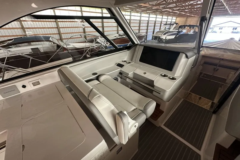 Slide: The Image of Interior of 2023 Regal LS36 boat with modern helm and seating. - 4