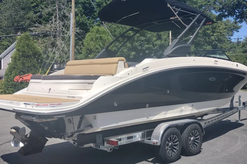 Slide: The Image of 2023 Sea Ray SDX 270 boat on trailer, featuring sleek design and modern amenities. - 5