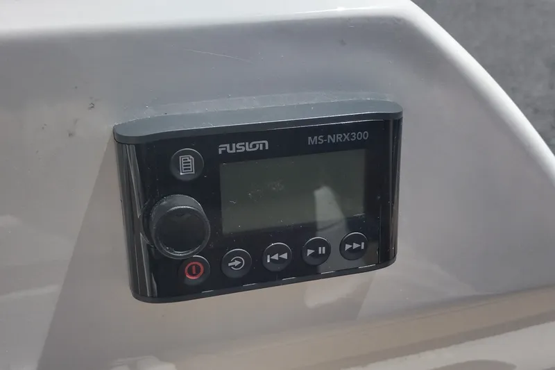Slide: The Image of Fusion MS-NRX300 marine stereo on 2023 Sea Ray SDX 270 boat dashboard. - 43