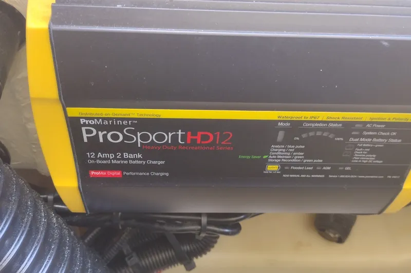 Slide: The Image of ProMariner ProSport HD12 marine battery charger on a 2023 Sea Ray SDX 270 boat. - 37