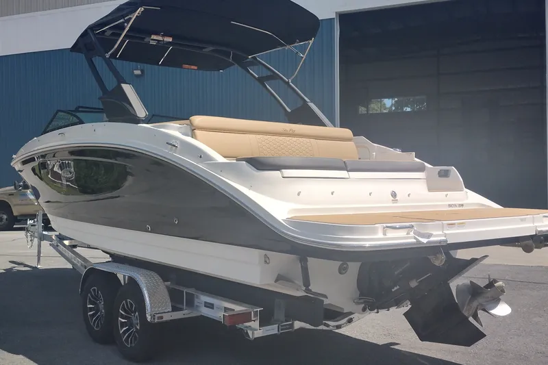 Slide: The Image of 2023 Sea Ray SDX 270 boat on trailer, featuring sleek design and modern amenities. - 7