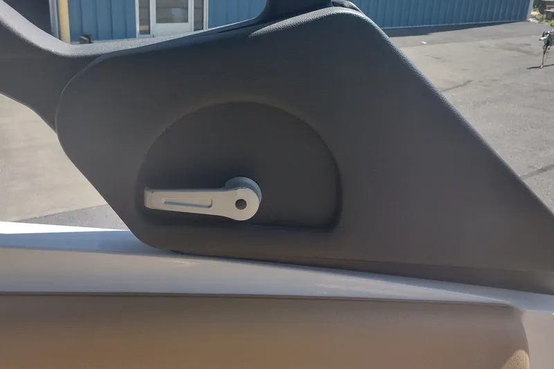 Slide: The Image of Interior detail of 2023 Sea Ray SDX 270 boat, featuring a manual lever. - 30