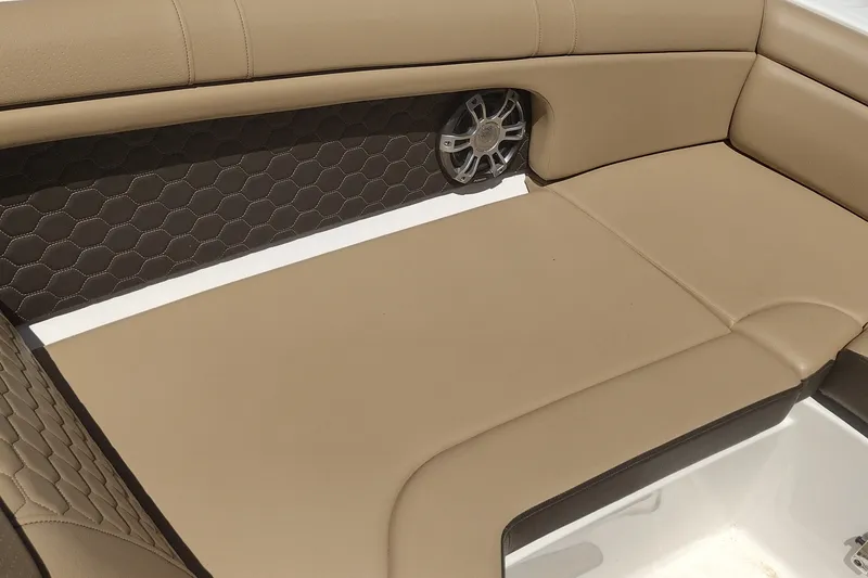 Slide: The Image of Luxurious tan seating on 2023 Sea Ray SDX 270 boat, featuring stylish hexagonal pattern. - 22