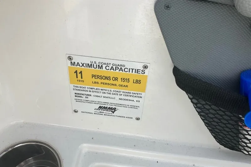 Slide: The Image of 2019 Cobalt 200S boat capacity label, maximum 11 persons or 1515 lbs. - 17