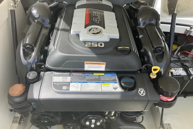 Slide: The Image of 2019 Cobalt 200S engine compartment featuring a Mercury 4.5L 250 horsepower engine. - 18