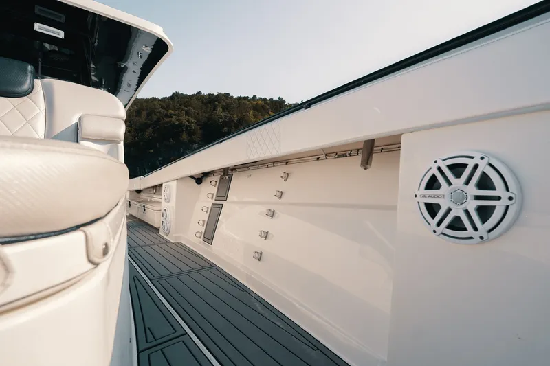 Slide: The Image of 2018 HCB 53 Suenos boat interior with luxury seating and marine speakers. - 34