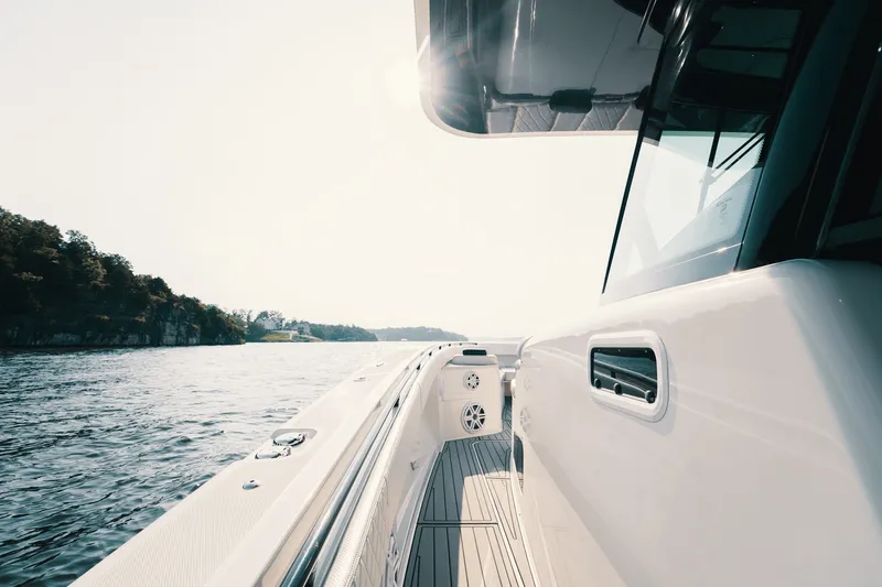 Slide: The Image of 2018 HCB 53 Suenos luxury boat cruising on a sunny day. - 51