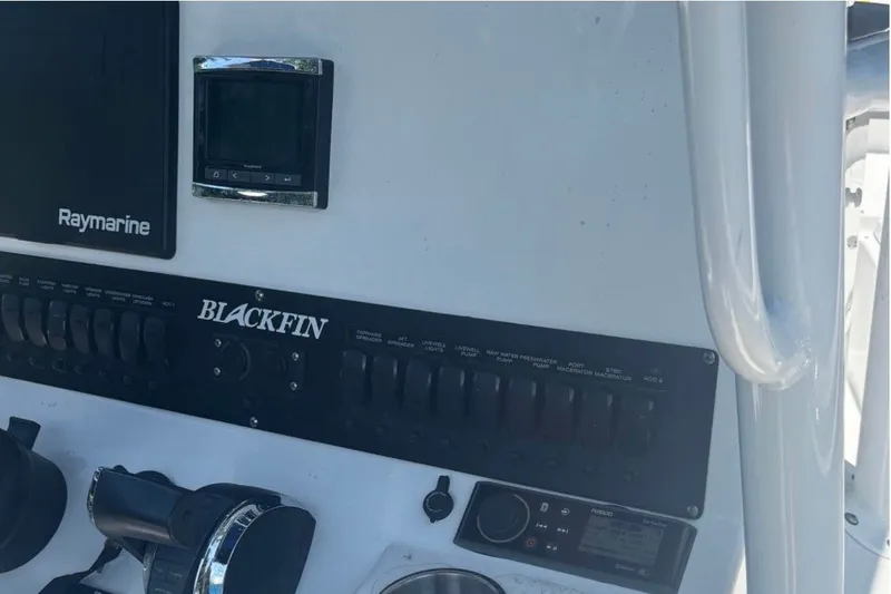 Slide: The Image of Control panel of 2019 Blackfin 242 CC boat with Raymarine electronics. - 4