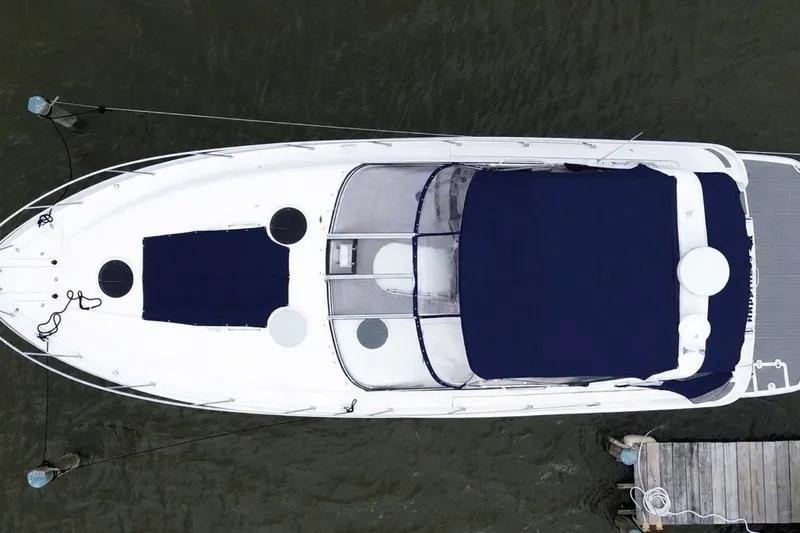 Slide: The Image of Aerial view of 2004 Regal Commodore 3860 yacht docked on water. - 6