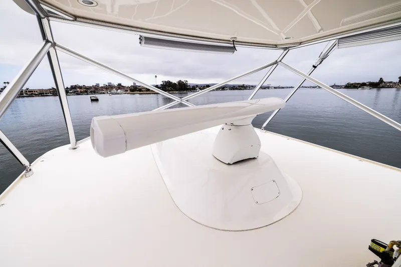 Slide: The Image of 2007 Cabo 31 Express boat radar on calm waters with scenic shoreline view. - 22