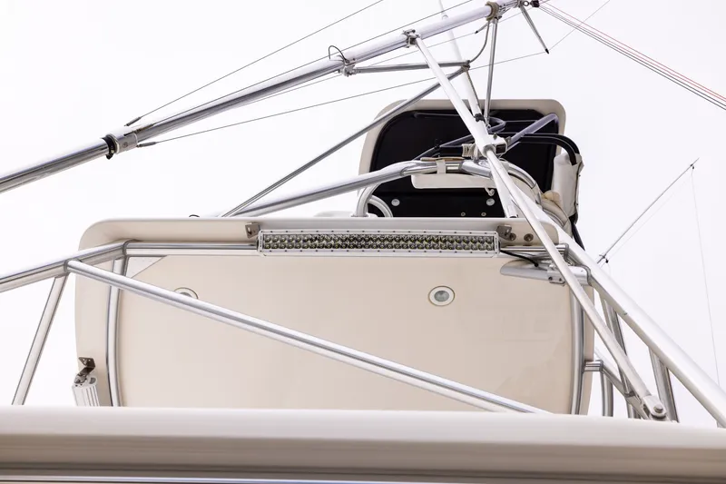 Slide: The Image of 2007 Cabo 31 Express boat tower with metal framework and equipment. - 23