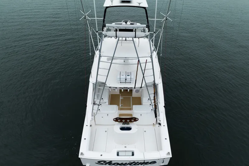 Slide: The Image of Aerial view of 2007 Cabo 31 Express boat on calm water. - 50