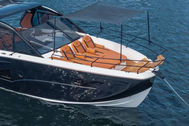 Slide: The Image of Luxury Hanover 387 yacht, 2026 model, with sleek design and sunbathing deck on water. - 7