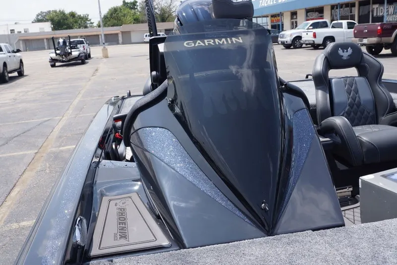 Slide: The Image of 2027 Phoenix 921 Elite X boat with Garmin system, parked in a lot. - 11