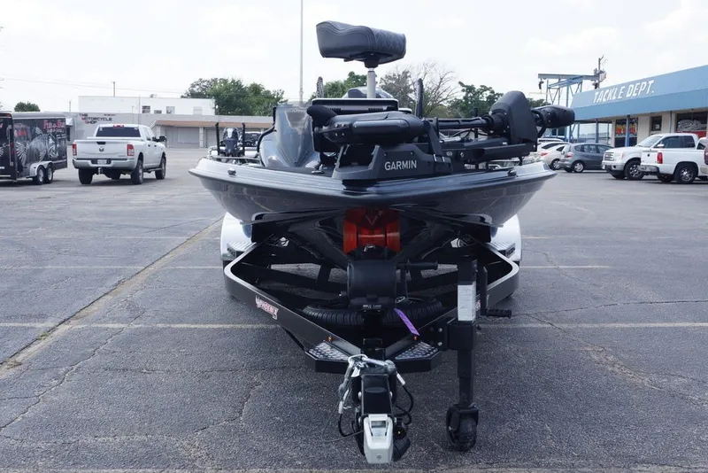 Slide: The Image of 2027 Phoenix 921 Elite X boat with Garmin equipment in a parking lot. - 6