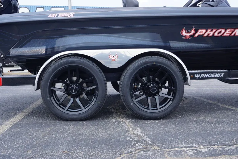 Slide: The Image of 2027 Phoenix 921 Elite X boat trailer with black alloy wheels. - 3