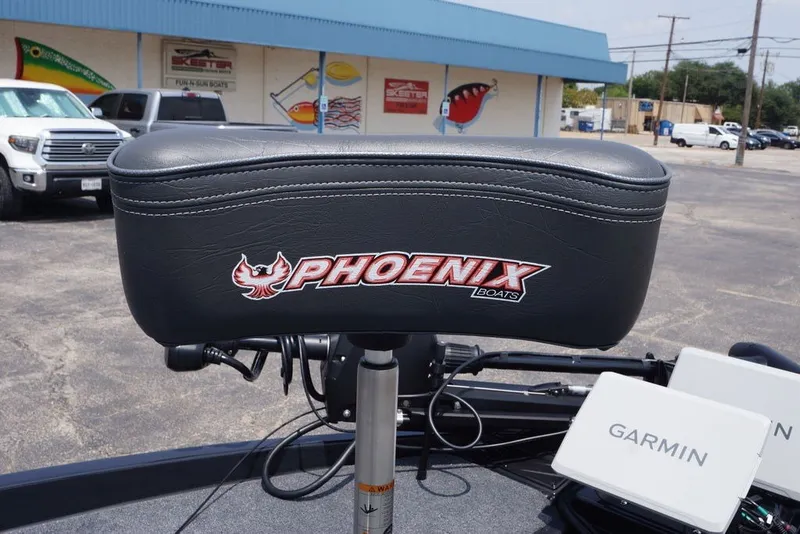 Slide: The Image of Phoenix 921 Elite X 2027 boat seat with logo, featuring Garmin equipment. - 21