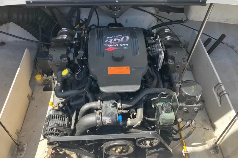 Slide: The Image of MerCruiser 350 MAG MPI engine in a 2003 Cobalt 220 boat. - 19