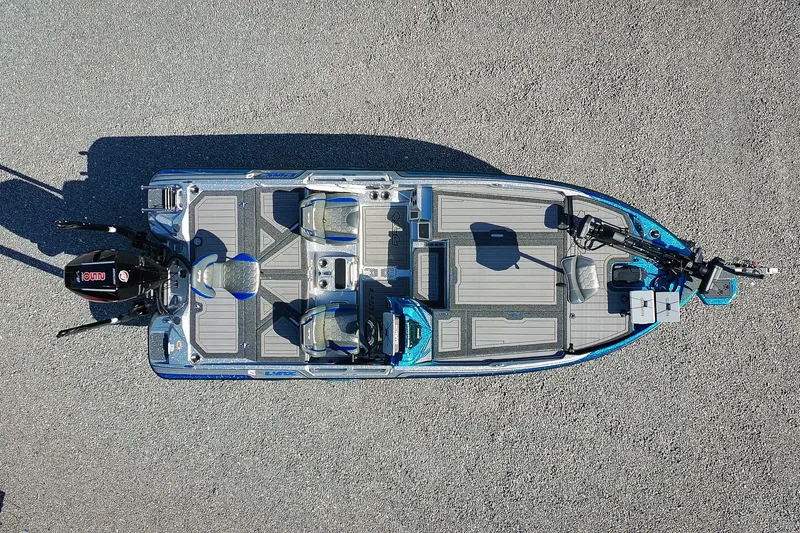 Slide: The Image of 2026 Bass Cat Lynx STS fishing boat, aerial view, showcasing spacious deck and seating arrangement. - 27
