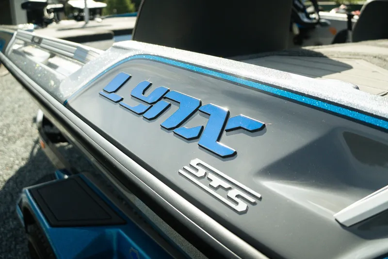 Slide: The Image of 2026 Bass Cat Lynx STS boat logo in close-up view. - 21