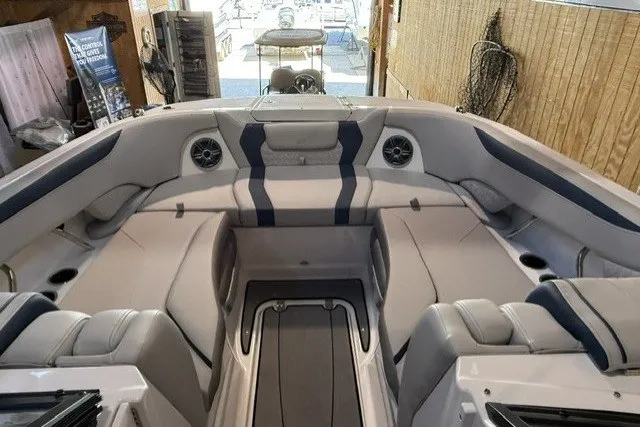 Slide: The Image of 2026 Hurricane SunDeck 2600 OB boat interior with spacious seating and modern design. - 14