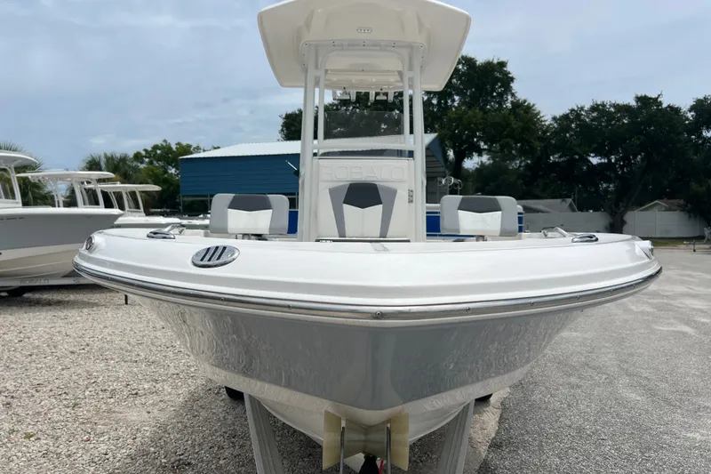 Slide: The Image of 2024 Robalo 226 Cayman boat displayed outdoors, showcasing sleek design and modern features. - 7