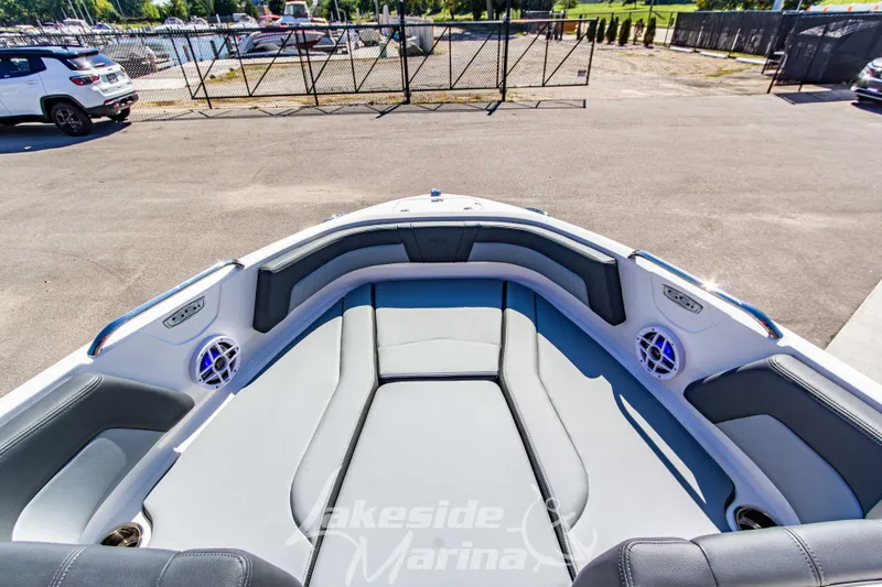 Slide: The Image of Bow seating area of 2026 Chaparral 21 SSi OB boat at marina. - 30