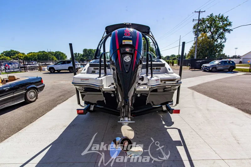 Slide: The Image of 2026 Chaparral 21 SSi OB boat with outboard motor at marina parking lot. - 7