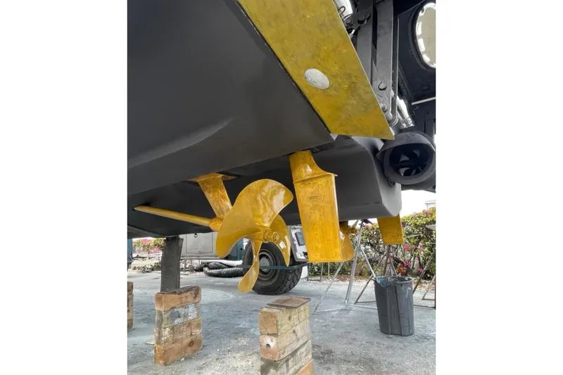 Slide: The Image of 2016 Sea Ray Sundancer 540 propeller and hull detail during maintenance. - 103