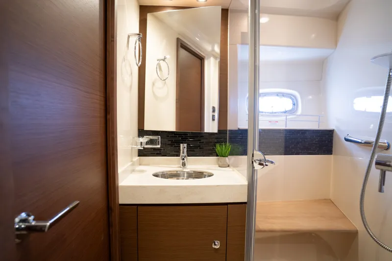 Slide: The Image of Luxurious bathroom interior of 2016 Sea Ray Sundancer 540 yacht with modern fixtures. - 69