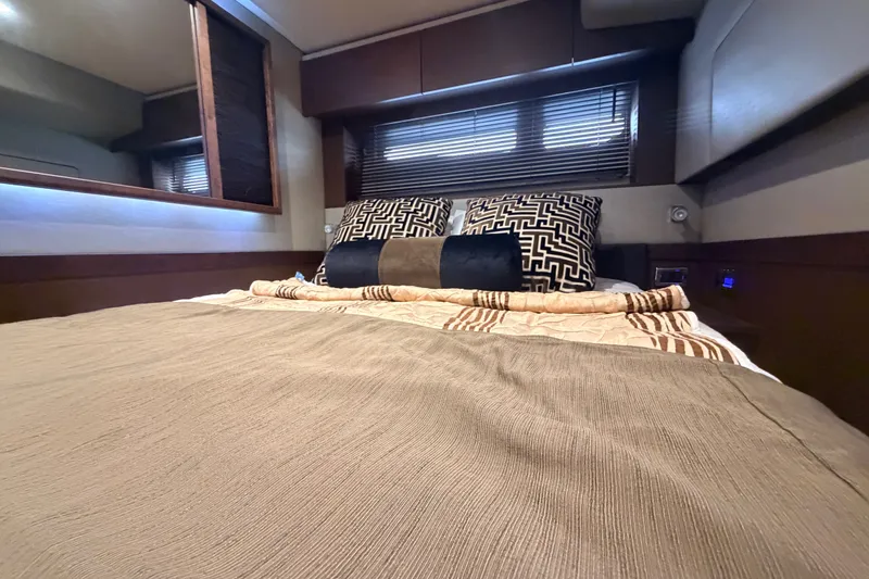 Slide: The Image of Luxurious bedroom interior of 2016 Sea Ray Sundancer 540 yacht with elegant bedding. - 82
