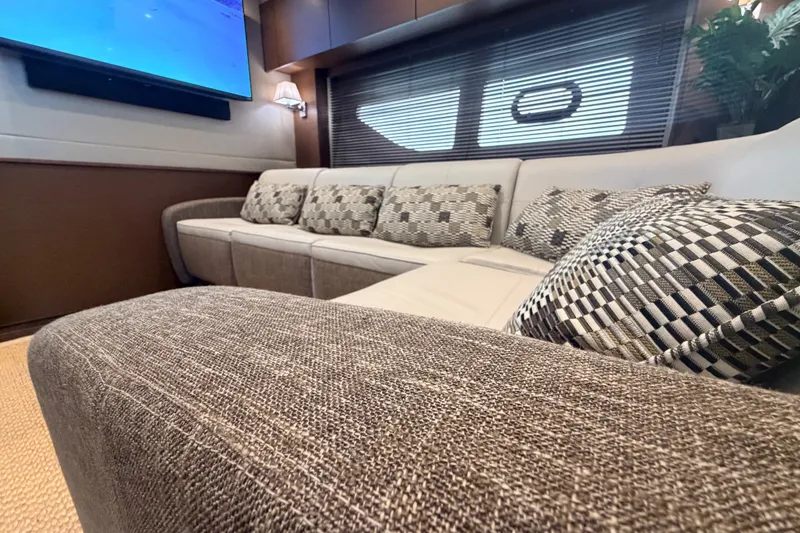 Slide: The Image of Luxurious interior of 2016 Sea Ray Sundancer 540 yacht with plush seating and modern decor. - 64
